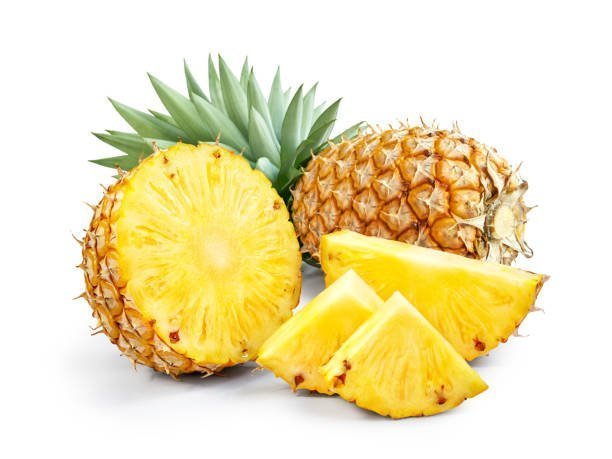 Whole pineapple with cut slices, the natural source of bromelain